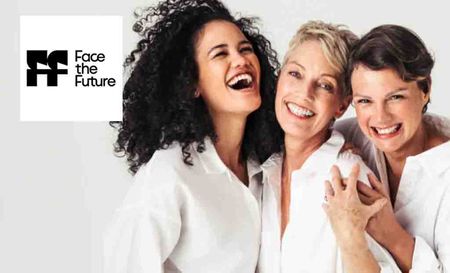 Face the future logo placed over three mature woman in white hugging and smiling 