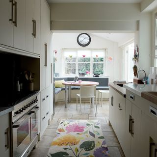 kitchen with white walls and microwave