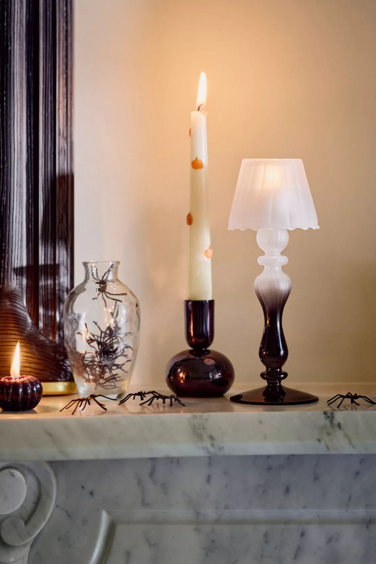 A black and white frosted glass tealight lamp