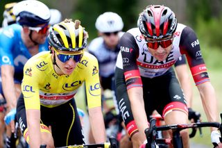 LIBOURNE FRANCE JULY 16 Tadej Pogaar of Slovenia yellow leader jersey Vegard Stake Laengen of Norway and UAETeam Emirates during the 108th Tour de France 2021 Stage 19 a 207km stage from Mourenx to Libourne LeTour TDF2021 on July 16 2021 in Libourne France Photo by Michael SteeleGetty Images