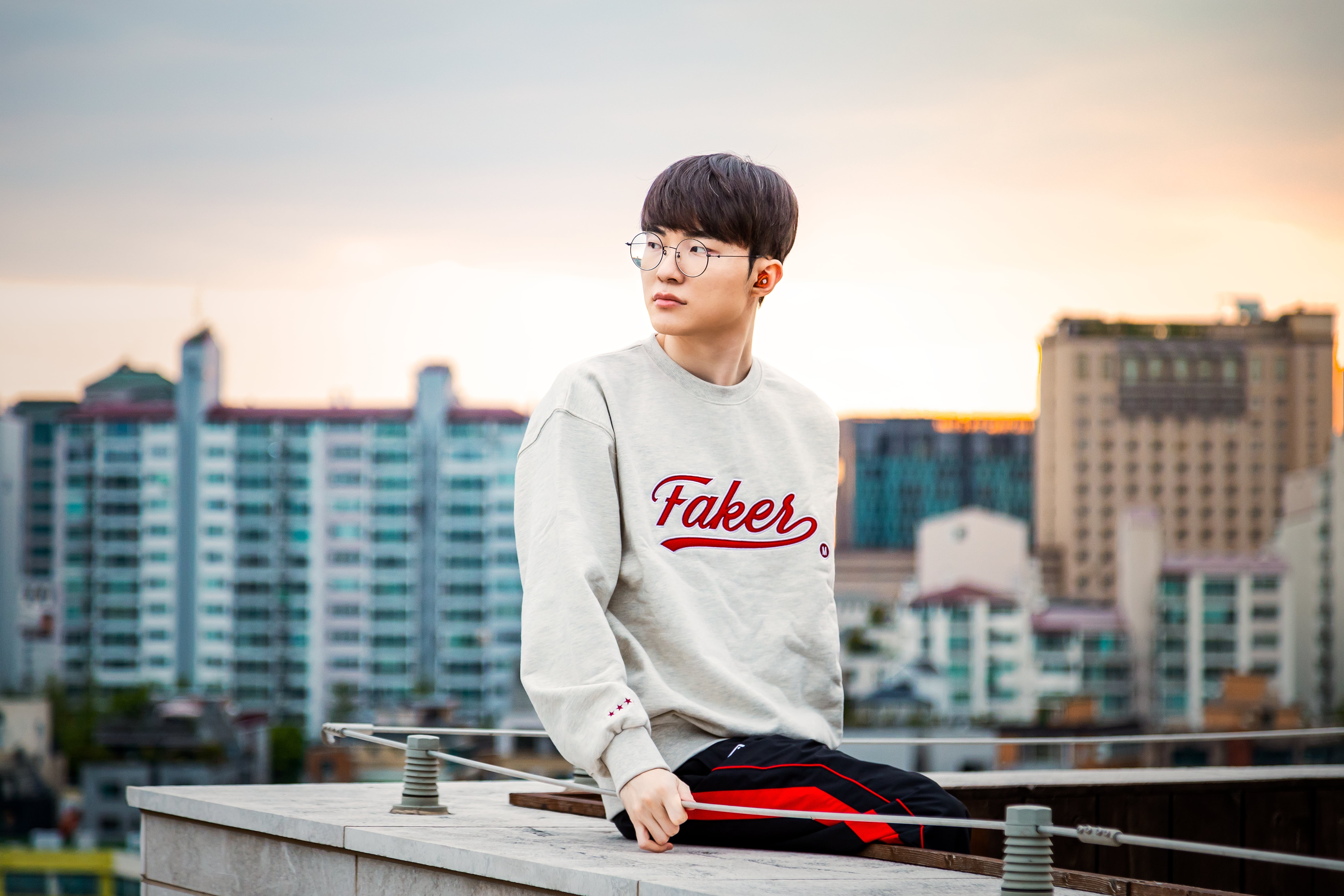 A lifestyle shot of the Glorange SteelSeries Arctis Gamebuds.