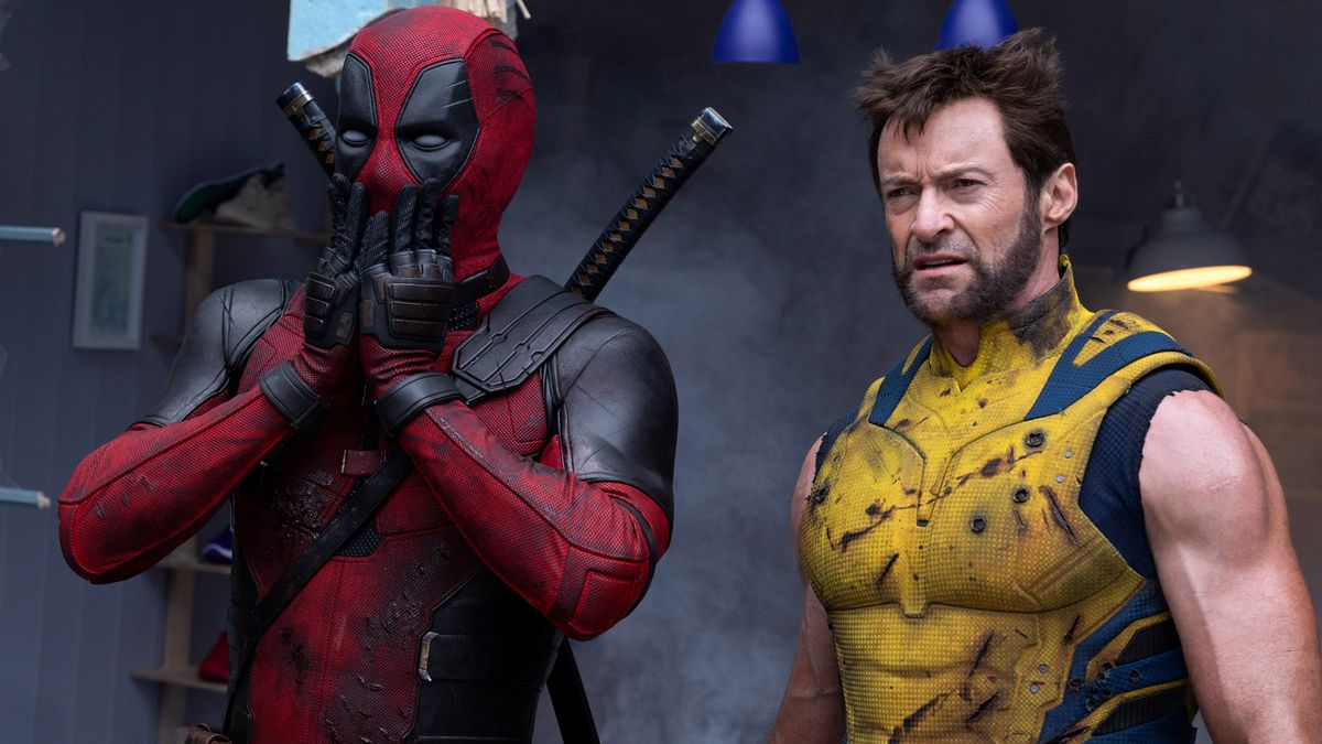 Deadpool holds his hands to his face as Wolverine stands next to him in Marvel&#039;s Deadpool and Wolverine film