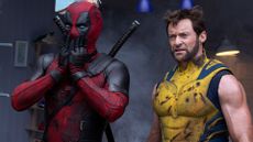 Deadpool holds his hands to his face as Wolverine stands next to him in Marvel's Deadpool and Wolverine film