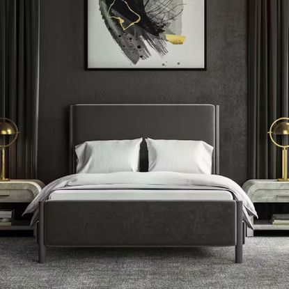 A Saatva bed in a black and gray bedroom