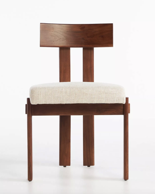 Contemporary accent chair with linen upholstery from Anthropologie.