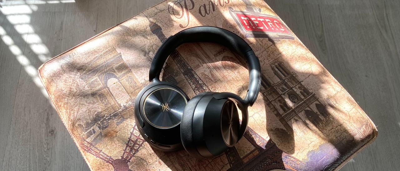 OneOdio Focus A6 over-ear headphones on a Parisian stool