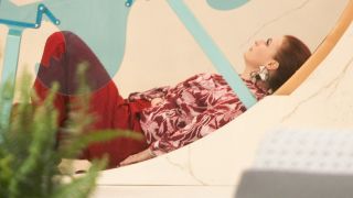 Rachel looking up at the sky in the hamster wheel