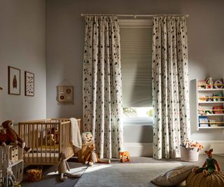 nursery bedroom with blinds and curtains at the window