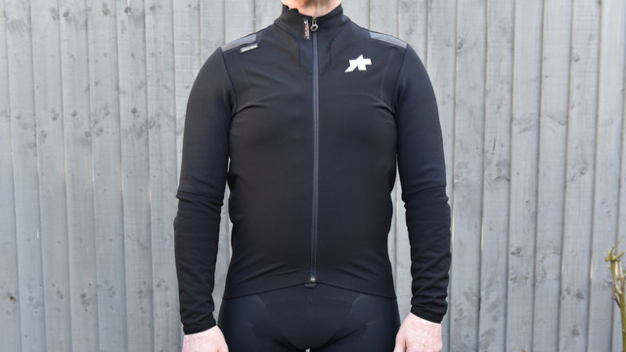 Image shows a rider wearing the Assos Equipe RS Johdah S9 Targa Winter Jacket