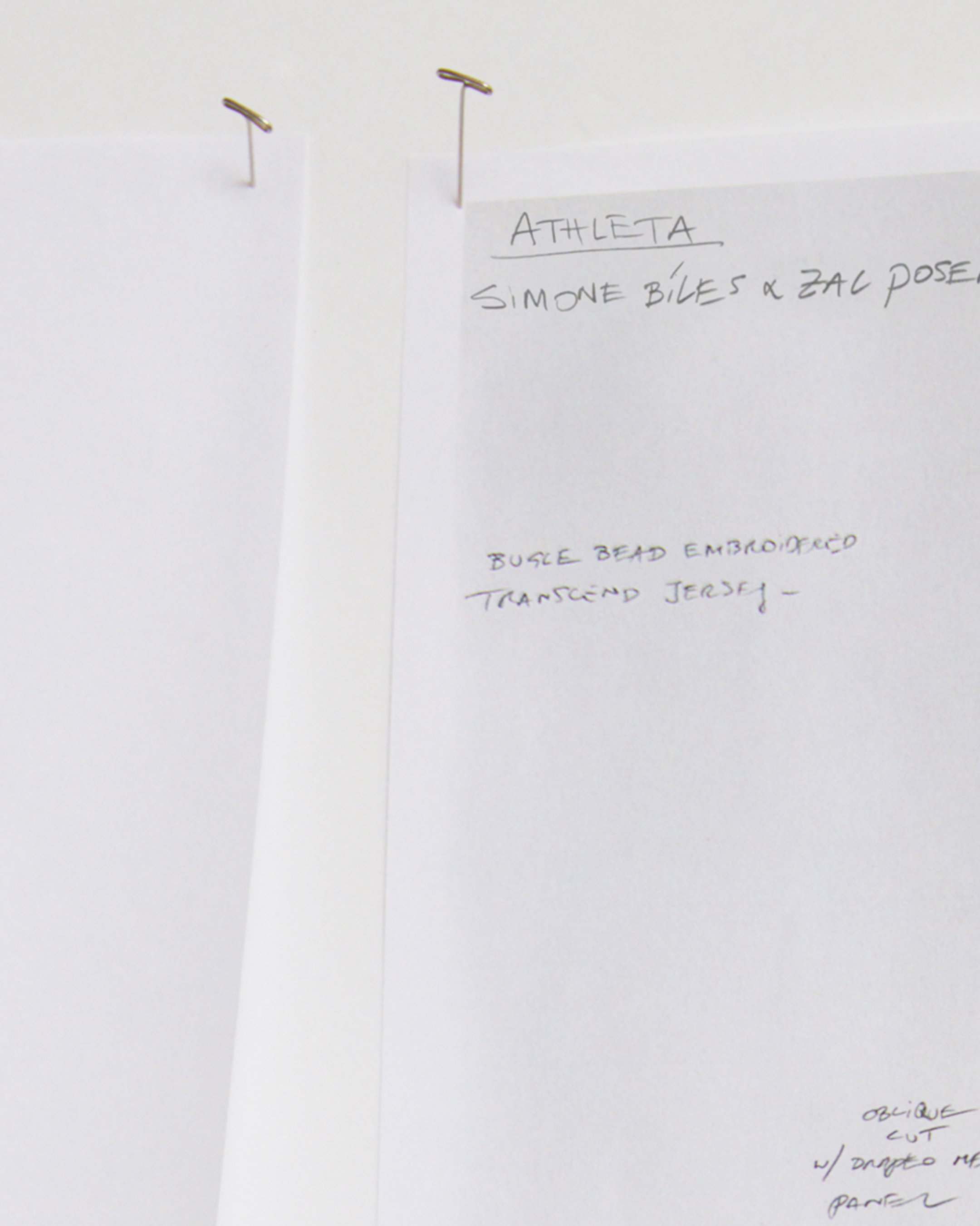 a close up of sketches from Athleta and Zac Posen for Simone Biles