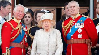 Prince Charles, Prince of Wales, Queen Elizabeth II and Prince Andrew, Duke of York watch a flypast from the balcony of Buckingham Palace