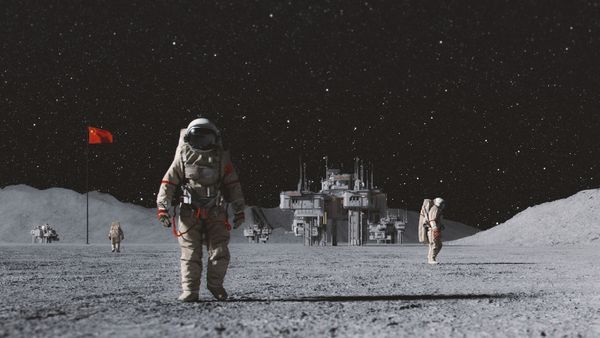 An illustration showing three astronauts roaming around the moon. One is coming closer to the camera. There&#039;s a moon base in the background as well as a red flag. The sky is dark and starry.