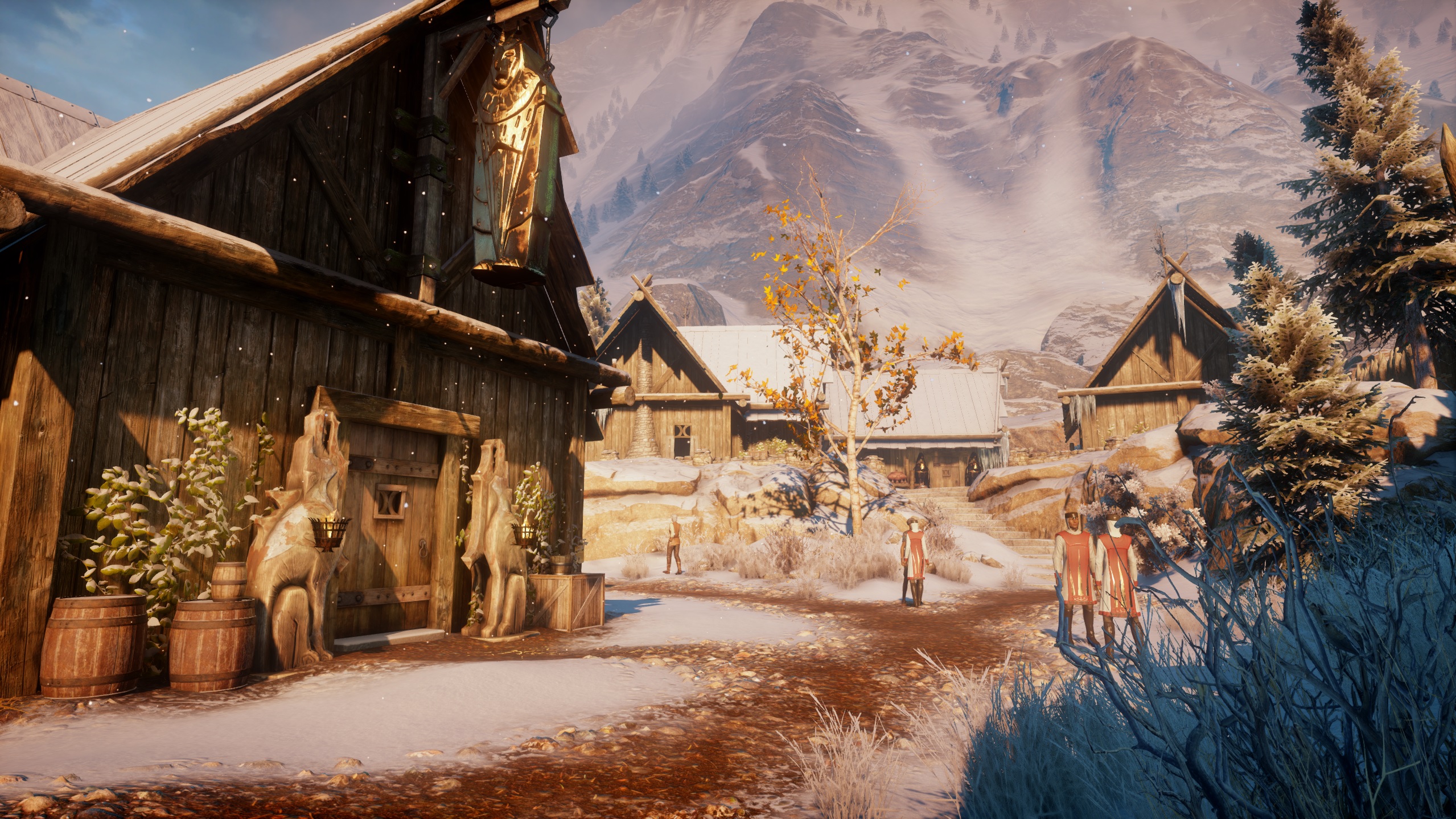 Dragon Age: Inquisition - Haven'daki karlı açık hava yolları ve binalar.