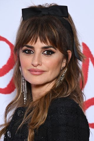 Penelope Cruz attends the "L'Immensita" photocall at Cinema Pathe Beaugrenelleon December 13, 2022 in Paris, France