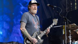 Brent Hinds performs onstage with Mastodon at Douglass Park in Chicago, Illinois on September 22, 2024