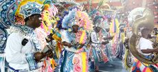 NASSAU, BAHAMAS - JULY 18: Matching band performers Junkanoo dance during the 2017 Youth Commonwealth Games Opening Ceremony on day 1 of the 2017 Youth Commonwealth Games at the Thomas A. Robinson National Stadium on July 18, 2017 in Nassau, Bahamas. (Photo by Mark Kolbe/Getty Images)