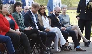 Meghan comforting Prince Harry at Invictus Games