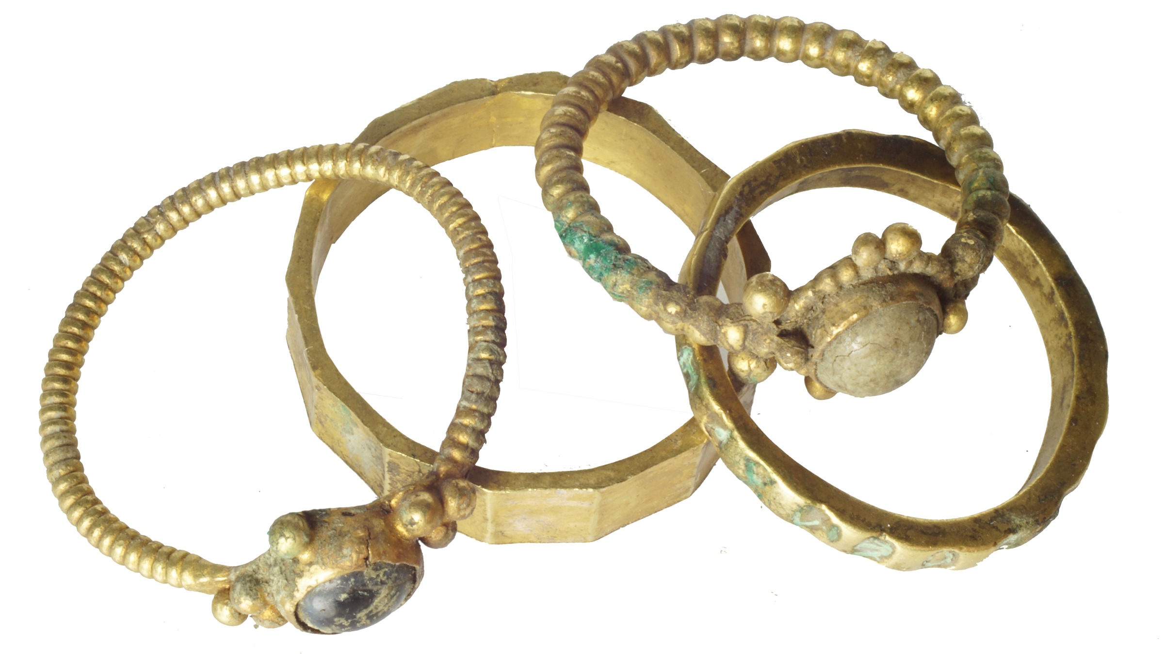 The four gold rings found in the medieval hoard.