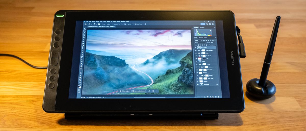 Huion Kamvas 13 on a wooden surface