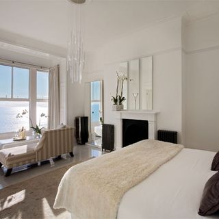 hotels bedroom with white wall bed and white window