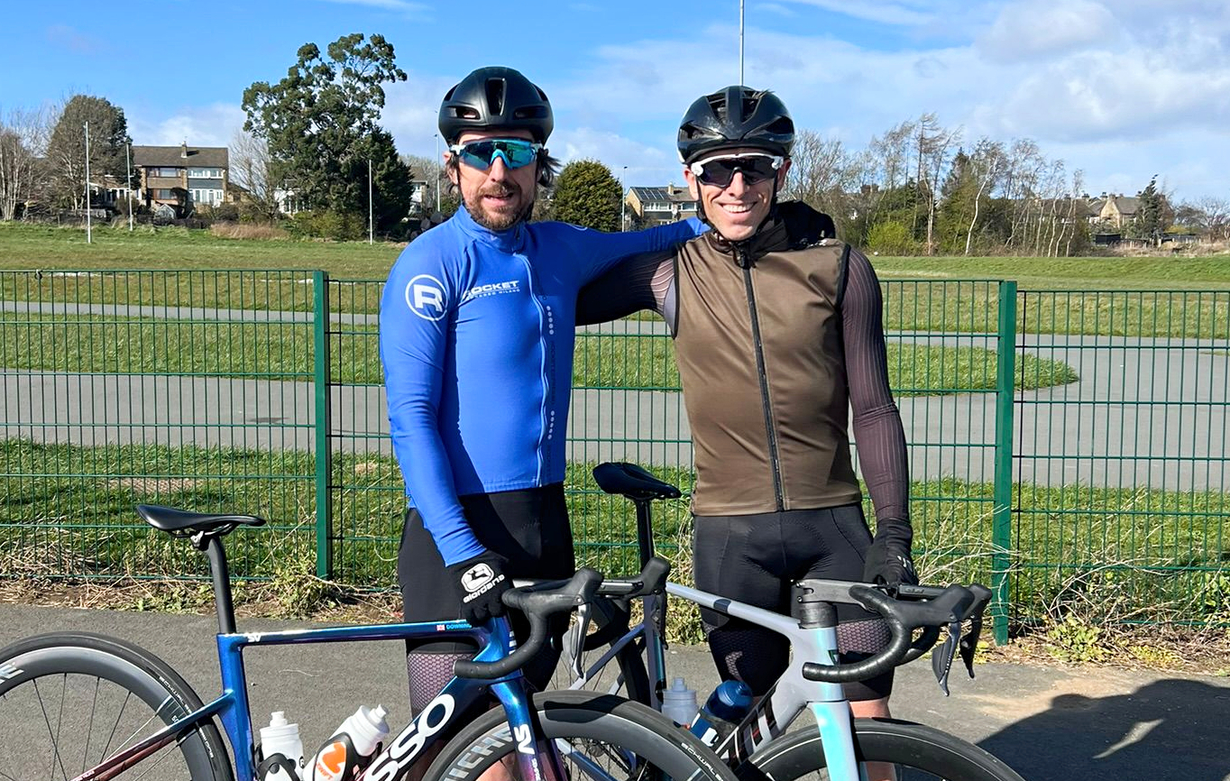 Russ and Dean Downing at a bike race in 2026
