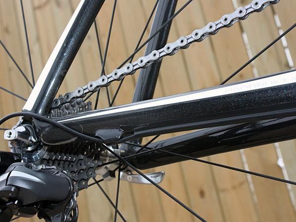 Custom stick-on cable guides help clean up the appearance and almost completely eliminate the need for unsightly zip-ties. Shimano offers the guides in both black and white.