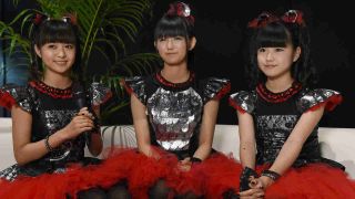 Babymetal posing for a photograph in 2015