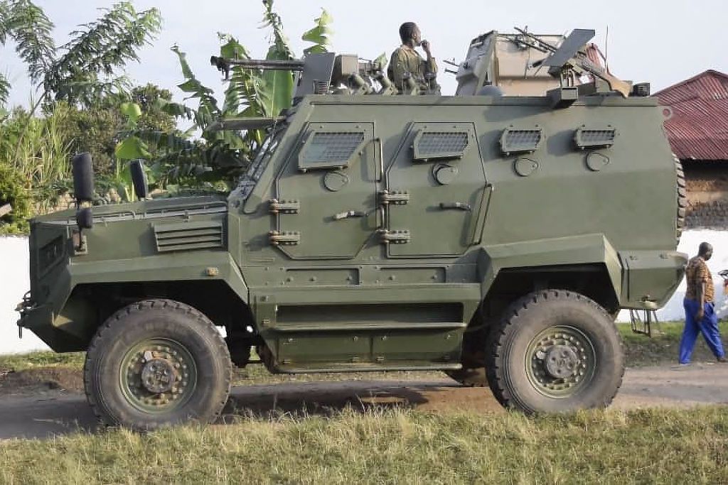 A Ugandan People&amp;#039;s Defense Force truck seen outside an attacked school.