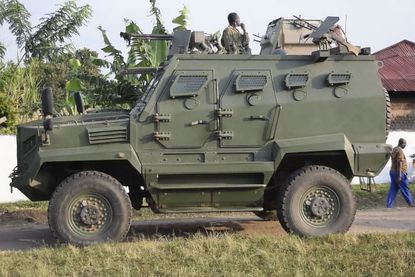 A Ugandan People's Defense Force truck seen outside an attacked school.