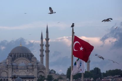 A Turkish flag flies over Istanbul