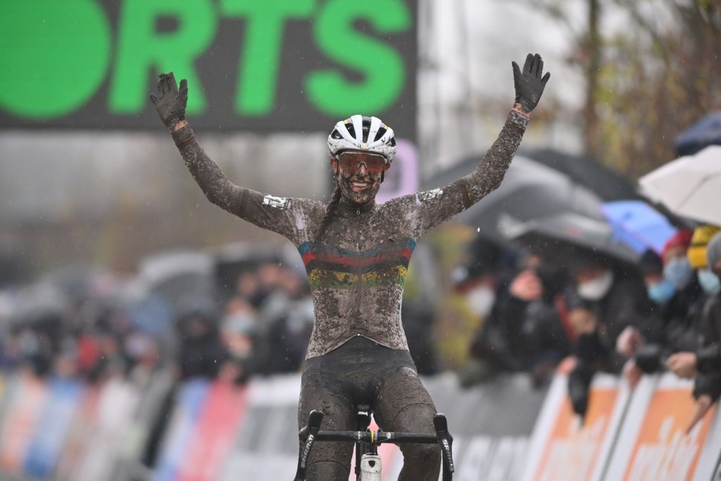 Dutch Lucinda Brand celebrates as she crosses the finish line to win the womens elite race of the Superprestige Boom fifth stage of the Superprestige cyclocross cycling competition Saturday 04 December 2021 in BoomBELGA PHOTO DAVID STOCKMAN Photo by DAVID STOCKMANBELGA MAGAFP via Getty Images