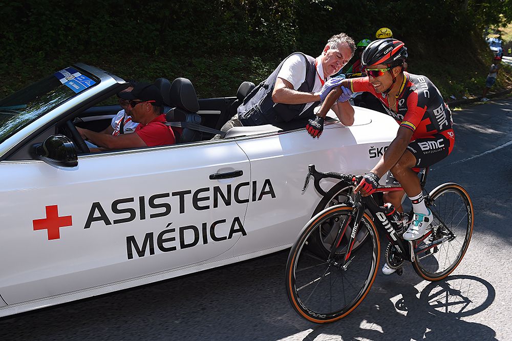 Darwin Atapuma (BMC) gets medical service after crashing out of the breakaway