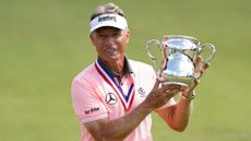 Bernhard Langer lifting the Senior US Open trophy after victory in July 2023