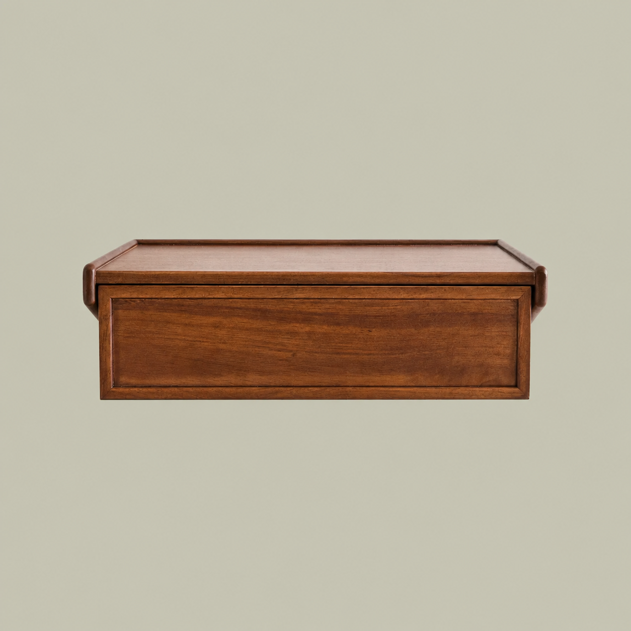 Dark wooden floating nightstand on a green background