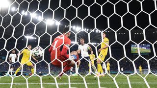 Harry Kane scores the opening goal in England's win over Ukraine in their Euro 2020 quarterfinal match on July 3, 2021.