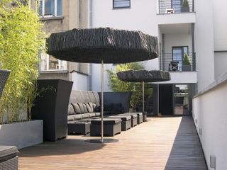go modern furniture black parasols over deck