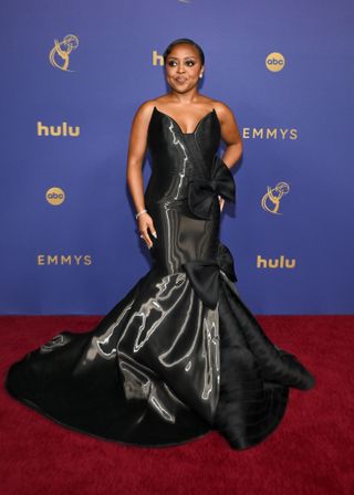 Quinta Brunson on the 2024 Emmys red carpet wearing a strapless dress