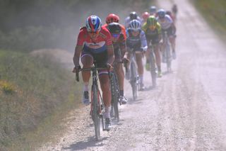 Chantal Blaak leads the field over the white gravel roads at Strade Bianche