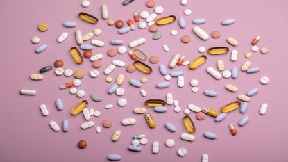 pills and tablets on table menopause supplements
