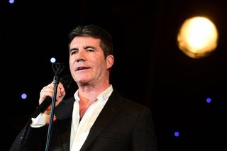 Simon Cowell receiving his Music Industry Trusts Award