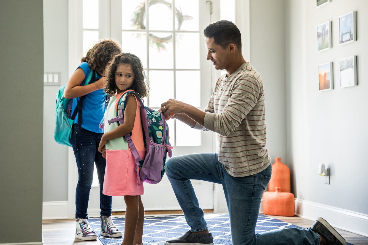 Back-to-school prep with father and daughter at home