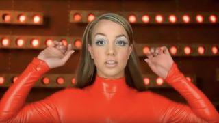 Britney Spears in music video for Oops I Did It Again