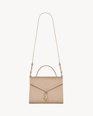 Saint Laurent, CASSANDRA Medium top handle bag in grain de poudre embossed leather