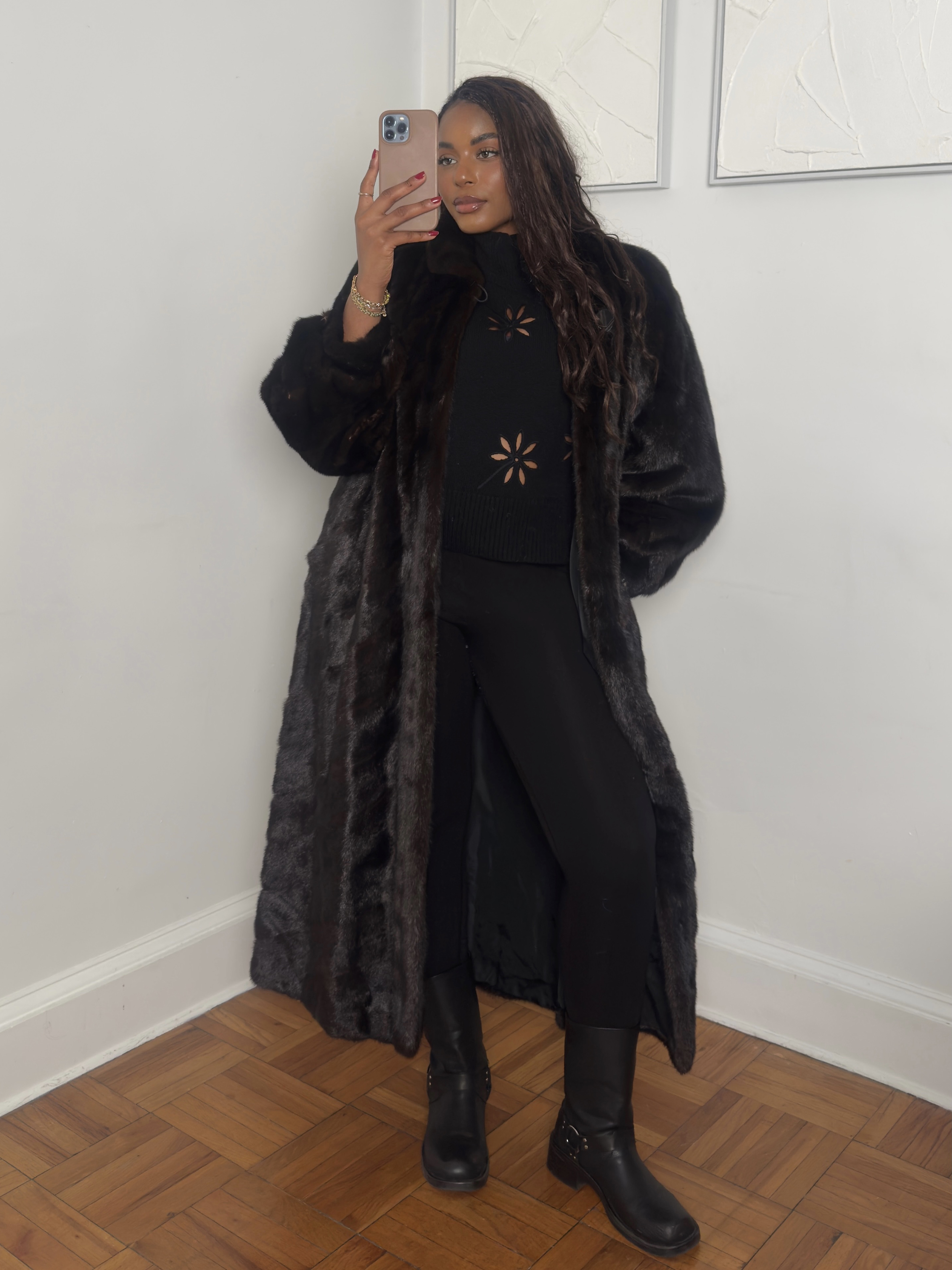 fashion and beauty influencer Kaye Bassey poses in a winter 2026 outfit formula with a statement fur coat