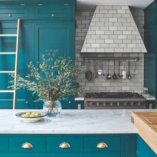 shaker style kitchen with cooker hood