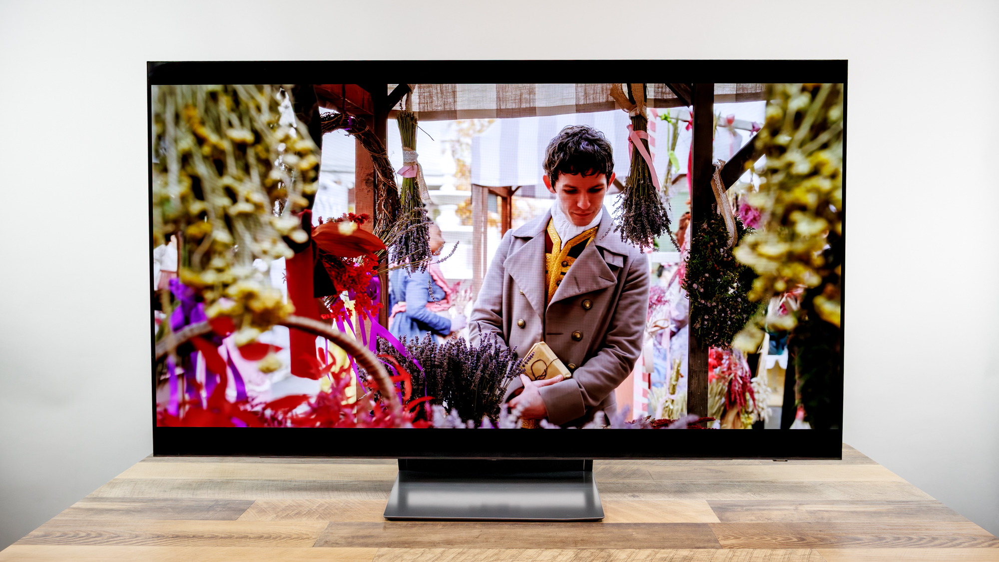 Samsung OLED S90H 4K TV on a desk