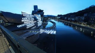 LIKE BEAUTY IN FLAMES, 2021 by Jenny Holzer, an AR text installation at the Guggenheim Bilbao in Spain
