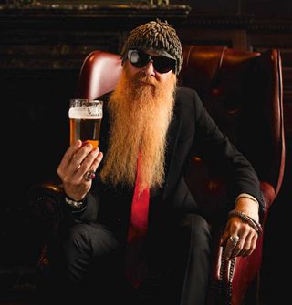 Billy Gibbons with a pint of beer