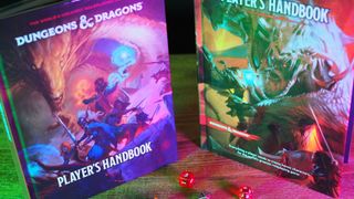 The new and old D&D Player's Handbooks alongside one another on a wooden table, with dice in front of them