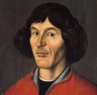 a portrait of a man in a red top. he looks like lord farquad.